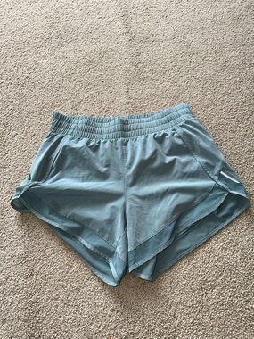 Athleta mesh racer run shorts.